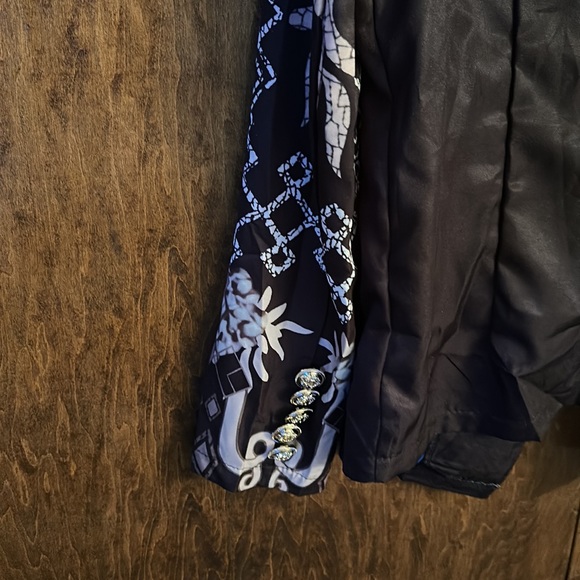 Jacket with gold buttons on front and sleeves. - Picture 4 of 4